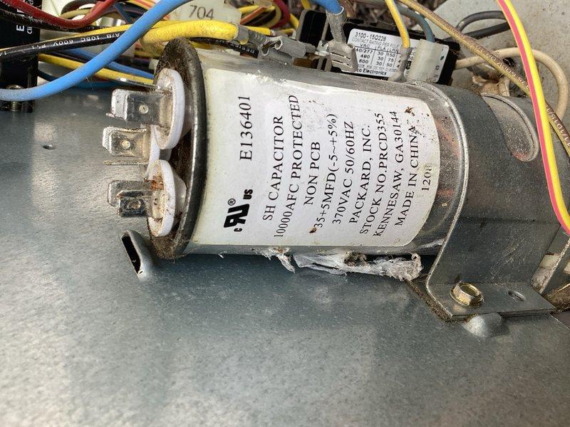 Responded to no cooling complaint on 15-year-old air conditioning system. Upon arrival, found evaporator coil completely iced over with suction lineset frozen solid from evaporator to condenser unit. Performed diagnostic inspection of blower assembly, verified blower operation and speed settings within normal parameters. Inspected outdoor condenser unit including capacitor, contactor, and compressor components. Noted visible wear and stress damage on condenser components resulting from extended operation with frozen refrigerant lines. Unable to perform refrigerant charge verification due to ice blockage preventing accurate pressure readings. System requires further evaluation after ice melts and professional assessment for potential compressor damage and refrigerant loss. Comfort advisor scheduled for same day to provide replacement options given age of equipment and extent of component wear.