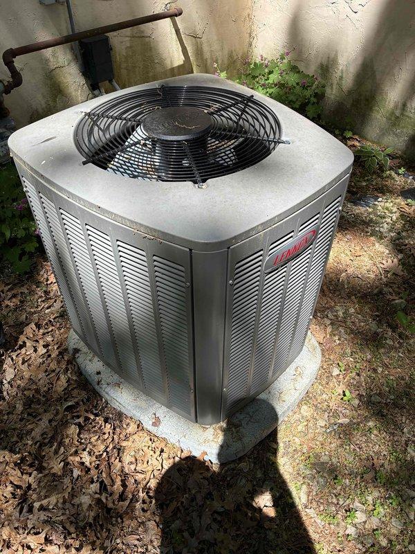 Responded to no cooling complaint on 5-year-old Bryant air conditioning system. Upon inspection, found condenser unit not operating due to rodent damage in electrical compartment. Discovered mouse nest inside condenser housing with chewed low voltage control wiring preventing system operation. Removed rodent nest and debris from electrical compartment. Repaired damaged low voltage wiring by splicing and insulating affected conductors. Sealed entry points with silicone to prevent future rodent intrusion. Tested system operation and confirmed proper cooling function with 19-degree temperature differential across evaporator coil. Installed customer-provided air filter to complete service call.
