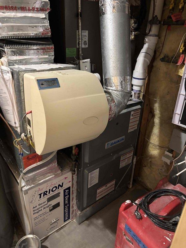 Completed annual cooling maintenance on three residential AC systems (Lennox and two Bryant units) utilizing R-410A refrigerant with outside ambient temperature at 76°F. Performed comprehensive inspection and testing on all three condensers including filters, thermostats, temperature differential measurements, condenser coils, motors, capacitors, compressors, refrigerant levels, and condensate drains. Deactivated humidifier system for summer operation. 

Identified three maintenance concerns requiring attention: Lennox unit capacitor (80+10 MFD) testing below specification and recommended replacement; Bryant secondary main floor unit showing indicators of potential refrigerant loss and recommended dye test with refrigerant charge; Bryant master bedroom unit exhibiting elevated amperage draw on fan motor and recommended motor replacement. Provided detailed estimates for all recommended repairs. Homeowner elected to defer all recommended repairs at this time and will monitor system perfo