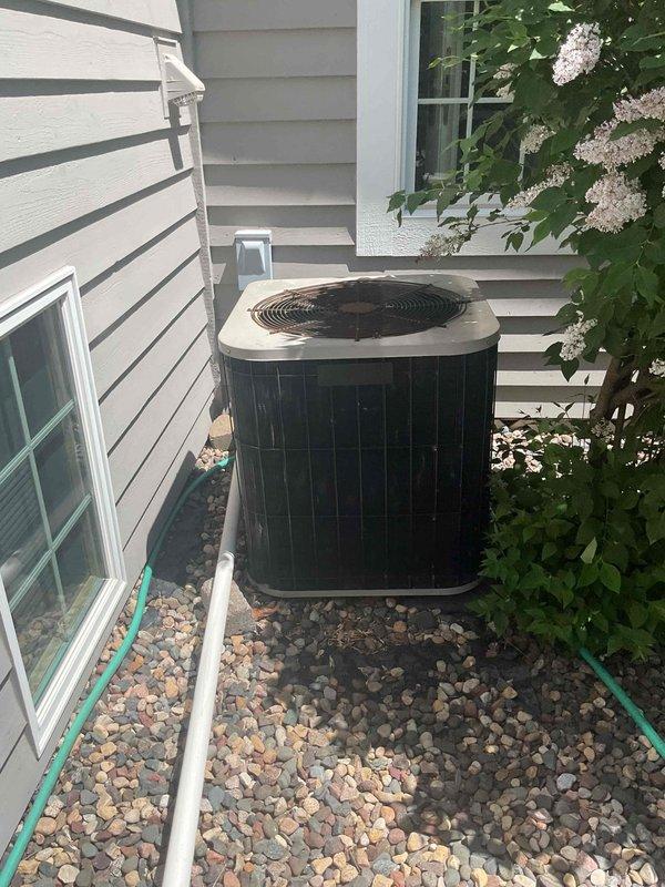 Responded to no cooling call on aging residential air conditioning system. Upon arrival, confirmed outdoor condenser unit was not running despite thermostat calling for cooling, with abnormal noise reported by homeowner. Diagnosed failed capacitor preventing compressor and condenser fan operation. Replaced defective capacitor with properly rated component, restoring system to normal operation and verifying adequate cooling performance.