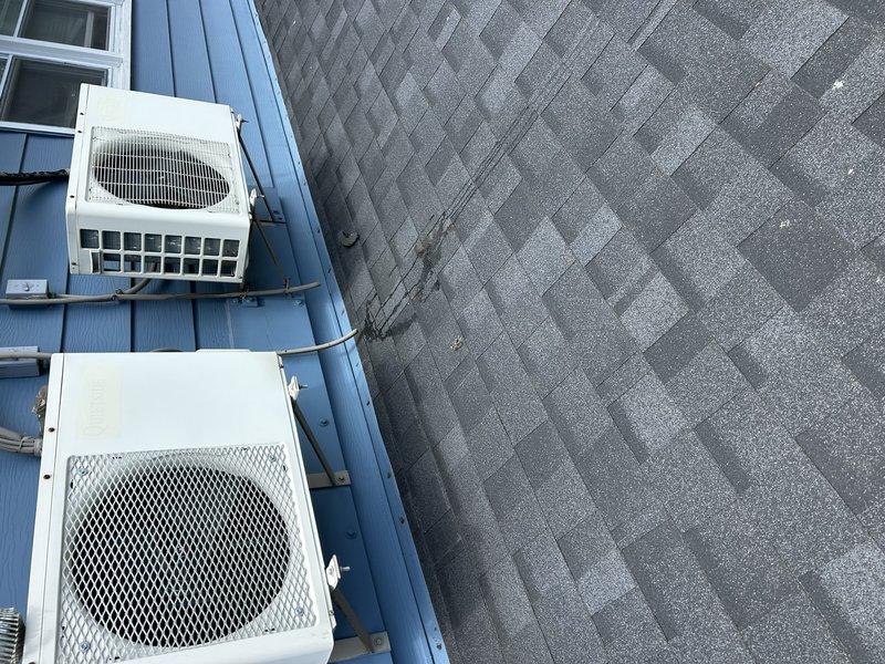 Responded to no cooling complaint on mini split system with water leaking onto floor. Diagnosed plugged condensate drain line causing water overflow and system malfunction. Successfully cleared drain line obstruction, restoring proper drainage and cooling operation.