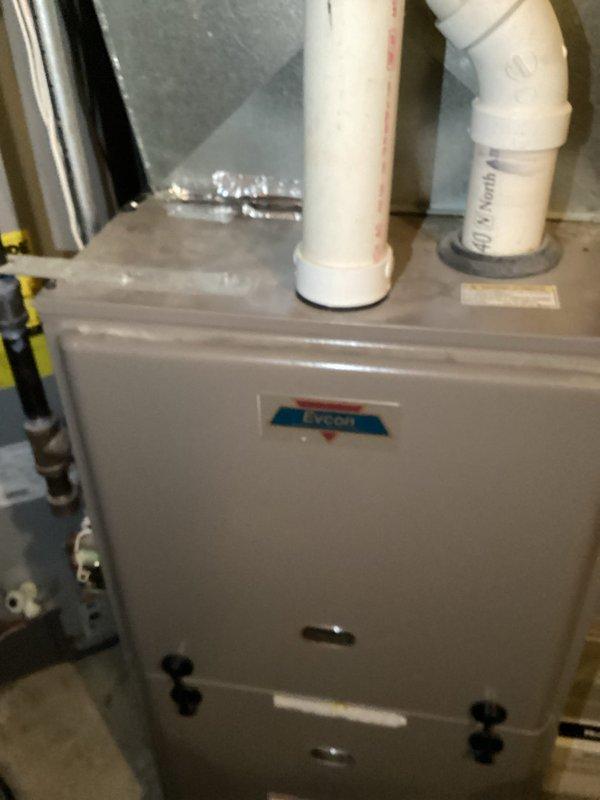 Responded to no cooling complaint on 20+ year old air conditioning system. Upon arrival, found evaporator coil frozen solid. Shut down system and allowed coil to completely thaw out. After thawing, performed diagnostics and confirmed system operating with low refrigerant charge. Unit utilizes R22 refrigerant. Given the age of the equipment, advanced refrigerant leak, and obsolete R22 refrigerant, recommended full system replacement rather than repair. Customer aware and will proceed with replacement.