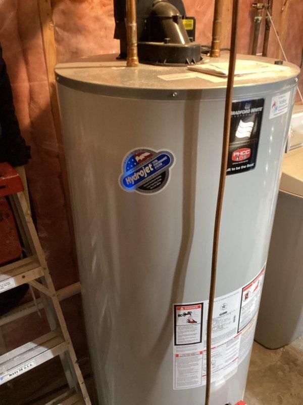 Responded to no cooling complaint on 10+ year old air conditioning system with system malfunction error displayed on thermostat. Diagnostic testing revealed failed condenser fan motor, defective run capacitor, and compressor exhibiting abnormal operational sounds indicating potential failure. Replaced condenser fan motor and run capacitor to restore system operation, though compressor condition warrants monitoring for future replacement needs.