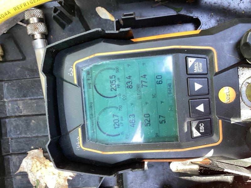 Responded to callback on newly installed Lennox unit experiencing short cycling issues. Upon arrival, performed diagnostic testing on the outdoor condenser unit and found system was severely overcharged. Measured subcooling at 45°F (specification 6°F) and head pressure at 354 PSIG (specification 245 PSIG at 70°F ambient). Recovered 2 pounds of refrigerant from the system to bring subcooling within manufacturer specifications. Verified proper operation with 18°F temperature split across the evaporator coil and confirmed 4°F space temperature drop within 45 minutes of runtime. System now operating correctly with no short cycling observed.