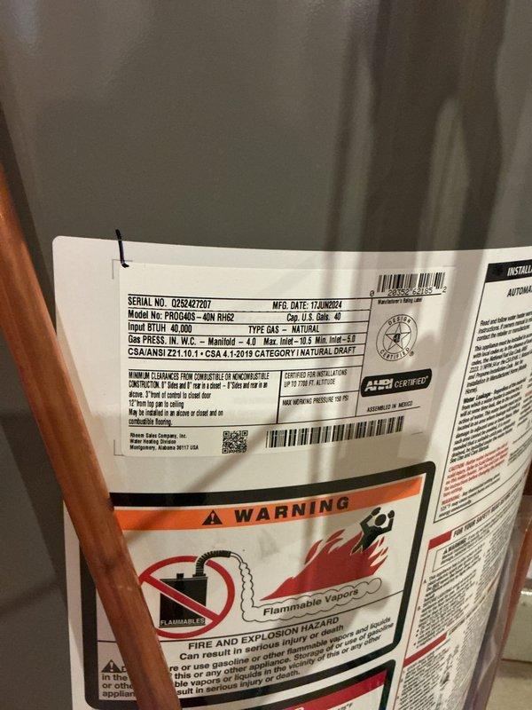 Performed routine maintenance flush on a 3-year-old Proline Power Vent tanked water heater (Model RURD2, 40,000 BTU input, natural gas). Drained sediment buildup from tank to maintain heating efficiency and extend unit lifespan, then refilled system and verified proper operation of all components including power vent assembly and safety mechanisms.