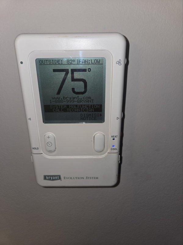 Responded to no-cool condition on 7-year-old Bryant system displaying thermal lockout malfunction message. Found outdoor condenser coil heavily obstructed with cottonwood debris, restricting airflow and causing system protection shutdown. Cleaned condenser coil thoroughly to restore proper airflow. Tested dual run capacitor and found failed (40+5 MFD), replaced with new capacitor. Cycled power at disconnect and reconnected outdoor unit control wiring at thermostat. System started successfully, verified proper temperature split across evaporator coil, confirmed adequate airflow at filter, and tested full cooling cycle. Unit operating within normal parameters upon completion.