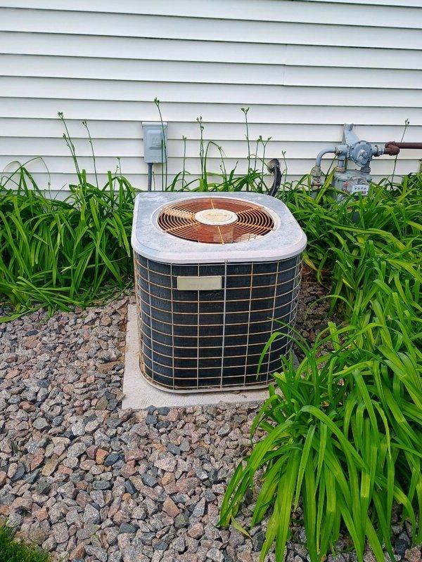 Responded to no cooling complaint on 30+ year-old Amana air conditioning system. Upon arrival, confirmed unit was running but not cooling effectively. Performed diagnostic inspection beginning with indoor components, verifying air filter condition and testing blower capacitor—both found to be in acceptable working condition. Proceeded to outdoor condenser unit and connected refrigerant gauges to measure system pressures. Diagnostic testing revealed critically low refrigerant charge with suction pressure reading only 10 psi during operation, well below manufacturer specifications. Low refrigerant pressure confirmed as primary cause of no cooling condition. Given the advanced age of the system (30+ years) and the refrigerant loss, coordinated follow-up appointment with service advisor to discuss repair options and system replacement recommendations with customer.