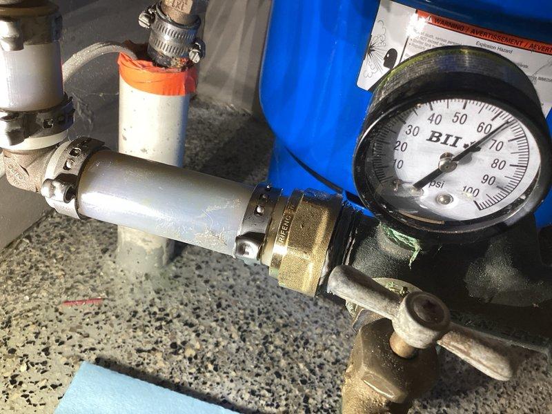 Responded to a water leak originating from the well system entering the residence. Upon inspection, identified an active drip at the male adapter connection on the inlet side of the well pressure tank tee fitting. Removed the faulty male adapter, installed a new replacement adapter, and reassembled all connections to restore proper seal and eliminate the leak.