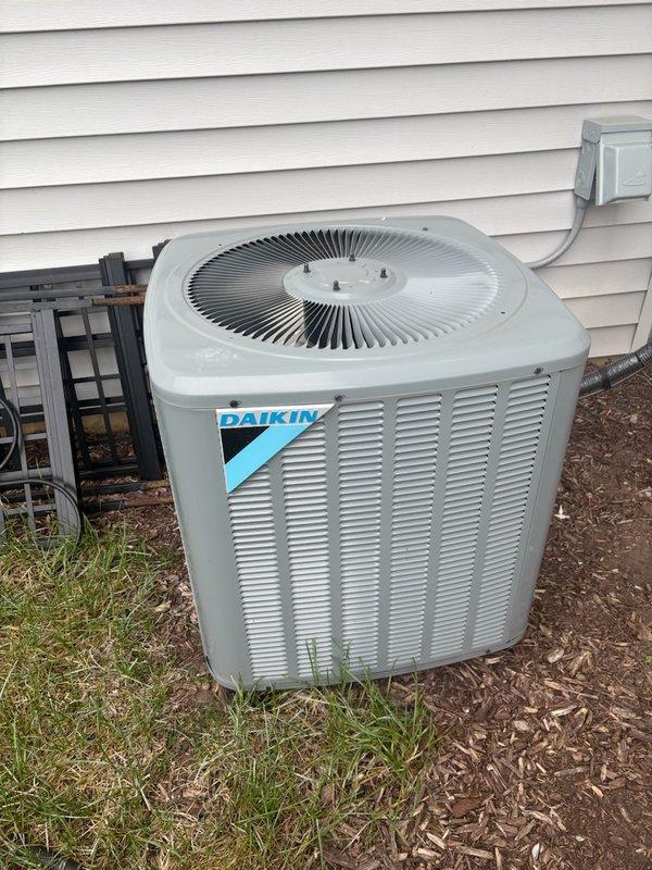 Responded to no cooling complaint on 2021 Daikin system. Found condenser coils completely plugged with debris, restricting airflow and preventing proper heat rejection. Thoroughly cleaned condenser coils, restored full airflow, and performed complete system checkout with no additional issues found.
