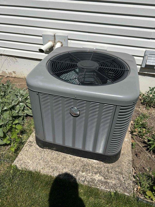 Responded to no cooling complaint on 9-year-old system with weak airflow and handler condensation. Found system low on refrigerant charge and heavily soiled air filter restricting airflow. System has history of previous refrigerant leak repairs including condenser leak and TXV replacement, indicating potential additional leak in system. Added refrigerant to restore proper charge levels, achieving target subcooling of approximately 7 degrees. Injected UV dye into system for future leak detection. System restored to proper cooling operation upon departure.