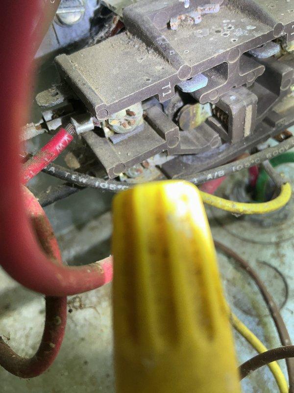 Completed comprehensive air conditioning maintenance tune-up on 26-year-old R22 refrigerant system. Inspected electrical components including contactor which showed visible rust and corrosion from age and moisture exposure, evaluated wiring connections and overall system operation. Comfort advisor consulted regarding system age and condition given the advanced age of the unit and obsolete R22 refrigerant type.