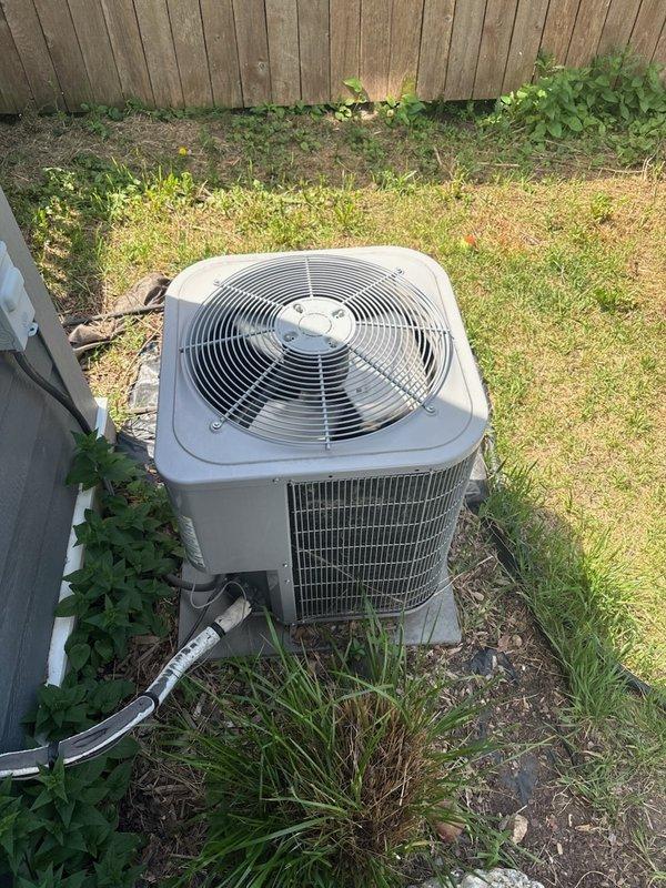 Responded to no cooling call on 11-year-old Carrier air conditioning system. Upon arrival, diagnosed dual capacitor failure affecting both compressor and condenser fan motor circuits. Replaced failed dual run capacitor, restoring system operation. Verified refrigerant charge within manufacturer specifications, confirmed proper amp draws on compressor and fan motor, and inspected condenser coil finding acceptable cleanliness. Contactor tested and found operational. Replaced furnace filter with customer-supplied media. Measured supply/return air temperature differential at approximately 20 degrees, confirming adequate system performance. Advised customer that extended operation on weakened capacitor may have caused cumulative damage to compressor and fan motor, potentially shortening remaining service life. Discussed repair versus replacement options given system age and condition.
