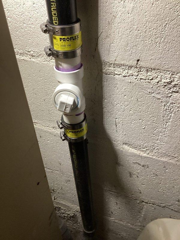 Responded to a clogged drain issue in the basement bathroom where the sink was backing up and the shower head had low water pressure. Diagnosed a plugged combination stack as the source of the drainage problem. Cut in a new cleanout fitting and successfully cleared the blockage, restoring proper drainage to the fixtures.