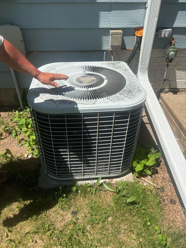 Responded to no cooling complaint on residential Tempstar air conditioning system manufactured in 1988. Upon arrival, performed diagnostic evaluation of outdoor condensing unit. System exhibited complete failure to provide cooling to entire home. Diagnostic testing confirmed compressor failure, rendering the unit inoperable. Given the age of the equipment at 36 years old and the cost of compressor replacement versus system efficiency, recommended full system replacement. Documented unit condition with photographs showing exterior condenser with accumulated debris and wear consistent with age. Comfort advisor contacted to provide replacement options and system upgrade recommendations to homeowner.