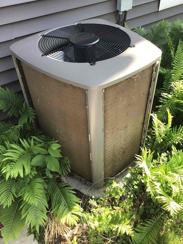 Responded to no cooling complaint on residential air conditioning system. Found outdoor condenser coil heavily packed with debris causing high pressure lockout fault. Performed thorough coil cleaning to restore proper airflow and heat exchange. Reset tripped breakers and properly labeled electrical panel for future reference. System startup confirmed with 18-degree temperature split across evaporator coil, verifying restored cooling capacity and normal operation.