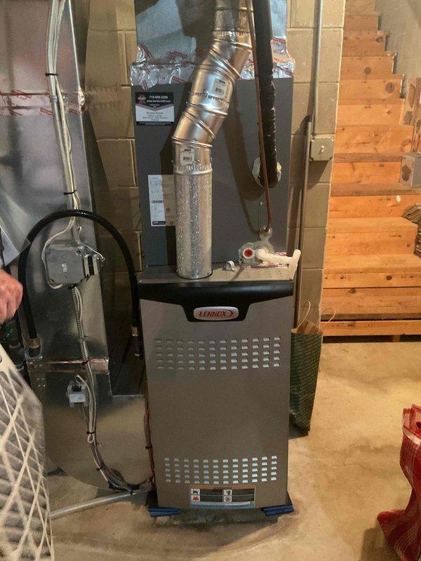 Responded to no cooling call on residential A/C unit installed in September. Found condenser not activating and system low on refrigerant. Added refrigerant and dye to system to restore cooling operation and enable future leak detection if needed.