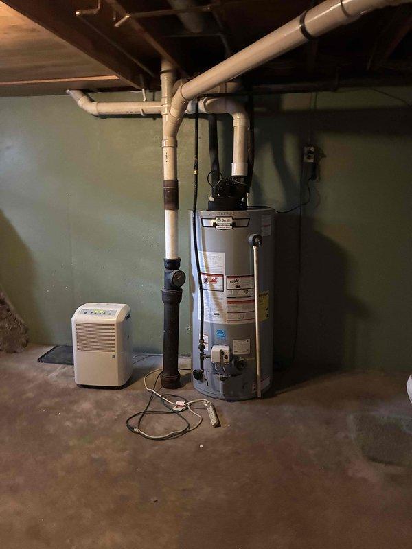 Responded to no cooling complaint on 3-year-old air conditioning system with thermostat set to 70°F but indoor temperature reading 79°F. Upon arrival, found system shut down with only fan operational. Discovered rodent remnants (squirrel or mouse) in outdoor electrical panel with damaged wiring, and condenser coil severely obstructed with debris. Repaired broken wire by installing new spade connector to restore electrical connection. Disassembled and thoroughly cleaned condenser coil to restore proper airflow and heat transfer. Performed complete system inspection including all electrical components, verified air filter condition (found clean), checked refrigerant charge and temperature differential across evaporator coil, confirmed proper coil sweating pattern indicating adequate refrigerant flow, and cleared condensate drain line. System restored to proper cooling operation. Advised customer that due to elevated indoor temperature exceeding 80°F, system would require extended runtime