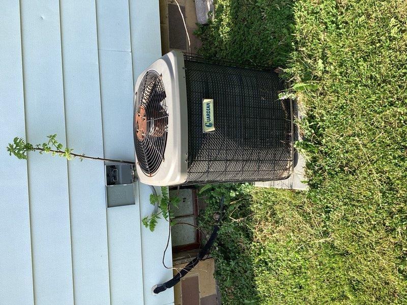 Responded to no cooling complaint on residential central air conditioning system. Upon arrival, confirmed thermostat was calling for cooling and condenser fan motor was operating, but compressor failed to start. Diagnostic inspection revealed severe deterioration of electrical studs on compressor terminal connections, with one stud completely detached from compressor housing. Additionally noted condenser fan motor showing signs of wear with existing hard start capacitor installed and shaft displaying increased resistance during rotation. Documented equipment condition with photographs. Informed customer of failed compressor electrical connections and aging condenser fan motor requiring repair or replacement. Recommended obtaining repair estimates for both components and suggested scheduling system replacement consultation due to advanced age and overall condition of equipment. Customer approved recommendations and replacement consultation was scheduled.