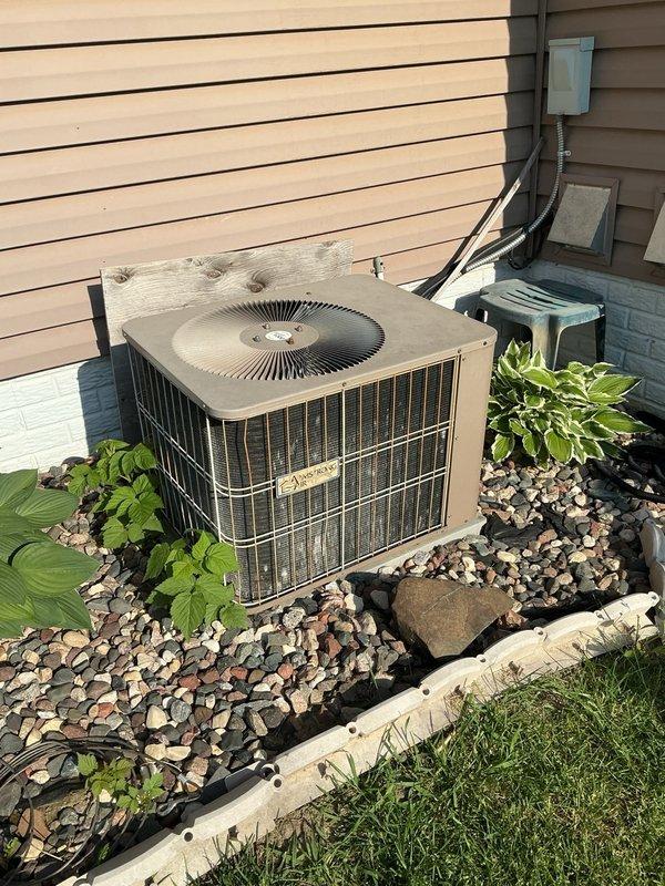Responded to no-cool complaint on residential air conditioning system. Homeowner reported outdoor unit had been icing up prior to shutdown. Upon arrival, activated system and observed all components operational but heard gurgling in refrigerant lines indicating potential low charge. Connected manifold gauges and confirmed system was low on refrigerant. Identified unit as older R-22 system. Advised homeowner that R-22 recharge is no longer a serviceable option and recommended system replacement. Shut down unit to prevent further icing and compressor damage until new equipment can be installed.