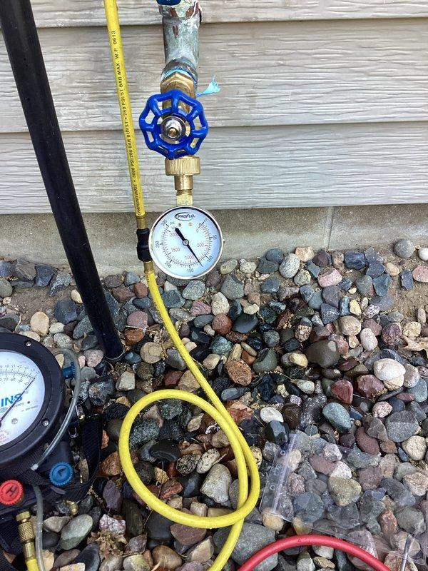 Responded to corroded outdoor spigot with spray leakage and broken valve connected to irrigation system. Addressed missing spigot end and leak at irrigation connection point. Performed testing and tagging of pressure vacuum breaker (PVB), replaced faulty vacuum breaker assembly with new unit, and provided estimate for pressure reducing valve (PRV) installation.