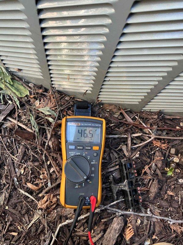 Performed annual air conditioning maintenance on dual 13-year-old Trane AC systems. Inspected contactors on both units (found in good condition), tested capacitors (upper unit capacitor out of specification), checked refrigerant charge (upper unit low, lower unit adequate), and measured temperature drops (lower unit 20°F, upper unit 16°F indicating low charge). Verified evaporator coils were clean on both systems. Replaced one dirty air filter; noted second filter is an Aprilaire 210 model. Discussed findings and repair options with homeowner, enrolled them in maintenance membership program, and scheduled follow-up service advisor appointment to address capacitor replacement and refrigerant recharge needs on upper unit.