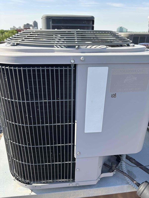 Responded to no cooling complaint on 20-year-old rooftop unit that attempted to start but made noise and would not operate. Upon arrival, verified thermostat calling for cooling properly. Inspected indoor unit and found dirty air filter restricting airflow and evaporator coil completely frosted over. Recommended immediate filter replacement and operated system in fan-only mode to defrost evaporator coil. Accessed outdoor condensing unit on rooftop and performed comprehensive inspection. Tested run capacitor with digital clamp meter, reading within acceptable range. Visually inspected condenser coil, found clean with no blockages. Checked refrigerant charge and confirmed levels appropriate with no signs of leakage. Measured temperature split across system, readings normal. After defrost cycle completed, cycled system through two complete cooling cycles with unit operating normally both times. All components functioning as designed at time of departure. Unable to definitively determine r