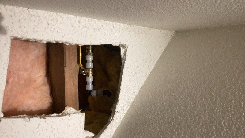 Responded to emergency water leak at exterior hose bibb that was actively pouring water, requiring immediate shutdown of main water supply to the property. Removed failed outdoor spigot assembly and accessed copper supply line through foundation wall. Installed new frost-free hose bibb with proper seating and connection to existing copper piping, ensuring watertight seal at all connection points. Restored water service to property and verified no leaks at installation site upon pressurization.