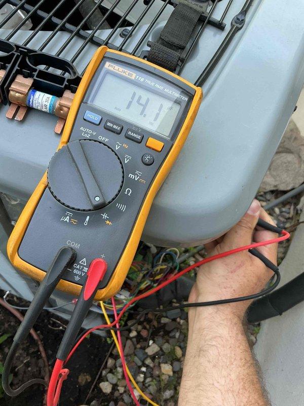 Responded to no cooling complaint on 9-year-old Daikin system with indoor temperature reading 75-76°F despite thermostat set lower. Upon arrival, diagnosed failed dual capacitor preventing compressor and condenser fan operation. Replaced defective capacitor, restoring full system functionality with proper cooling operation. Performed comprehensive system evaluation including electrical testing with multimeter, verified refrigerant charge at proper levels, and confirmed temperature split at 19°F across evaporator coil, which is within manufacturer specifications. All system components tested and operating normally with no additional issues identified.