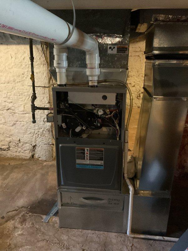 Responded to no cooling complaint on system where maintenance was recently completed. Found outdoor unit not operating due to capacitor making contact with low voltage terminal, causing electrical short that damaged both outdoor unit controls and indoor thermostat. Remounted capacitor in proper position to prevent contact with electrical components, replaced damaged thermostat, verified system operation and proper cooling cycle. All repairs completed under warranty.