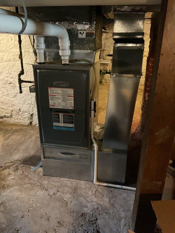Responded to no cooling complaint on system where maintenance was recently completed. Found outdoor unit not operating due to capacitor making contact with low voltage terminal, causing electrical short that damaged both outdoor unit controls and indoor thermostat. Remounted capacitor in proper position to prevent contact with electrical components, replaced damaged thermostat, verified system operation and proper cooling cycle. All repairs completed under warranty.