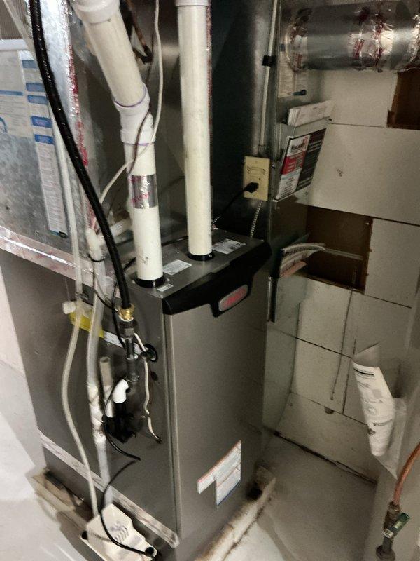Responded to service call for non-functioning sump pump with standing water in basin. Upon inspection, determined existing pump had failed and was no longer operational. Removed defective sump pump unit from basin and installed new replacement pump with proper float switch assembly. Installed new check valve on discharge line to prevent backflow. Tested system operation to verify proper pumping function and automatic float activation. System now operating correctly with basin draining as designed.
