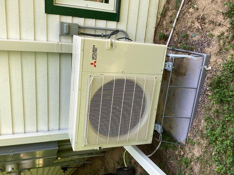 Responded to no-cool condition on less than one-month-old Mitsubishi mini split system with flashing power light. Upon arrival, confirmed system not cooling and observed refrigerant pressures were present but not fluctuating properly during operation. Performed systematic troubleshooting of unit components and discovered suction line king valve remained in closed position from installation while liquid line king valve had been properly opened. Opened suction line king valve to correct position, restoring proper refrigerant flow through system. Verified system operation with proper temperature differential and refrigerant pressures within manufacturer specifications. System operating normally at time of departure.