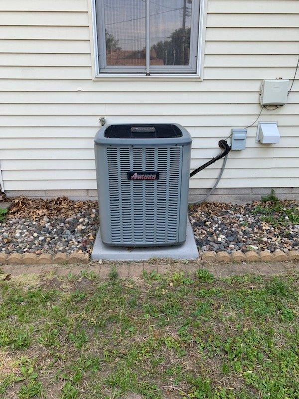 Responded to no cooling call on 12-year-old Amana system. Found compressor and condenser fan motor not operating while indoor unit and thermostat functioned normally. Performed diagnostic testing and measured refrigerant pressures, which revealed system was significantly low on charge. Pressure readings and leak assessment indicated a substantial refrigerant leak in the system. System utilizes obsolete refrigerant type, making repair economically unfeasible. Discussed findings with customer and explained that due to the age of equipment, extent of refrigerant loss, obsolete refrigerant, and cost of repairs versus replacement, a new system installation would be the recommended solution. Scheduled replacement estimate appointment. Customer elected to proceed with system replacement rather than repair.