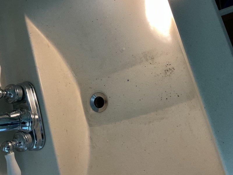 Responded to a bathroom sink with severely restricted drainage that was completely plugged. After initial assessment confirmed solid blockage, deployed mechanical snake equipment through the drain line approximately seven times to clear the obstruction. Successfully restored full drainage flow to the fixture, with sink now draining at optimal rate.