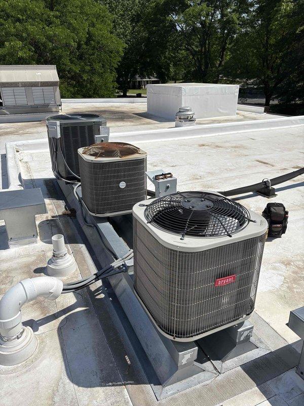Responded to no cooling complaint on 2016 Bryant rooftop unit with all components running but inadequate cooling performance. Verified thermostat calling for cooling properly, inspected air filter and blower operation with normal findings, and accessed rooftop unit to perform comprehensive diagnostics. Checked evaporator coil condition, capacitor values, and contactor operation—all within acceptable parameters. Measured refrigerant charge and found system extremely low on refrigerant, indicating probable refrigerant leak in the system. Presented repair options including leak detection with UV dye injection and refrigerant recharge to locate and repair leak. Customer declined repair services at this time and requested replacement options instead. Scheduled comfort advisor appointment for system replacement estimate.