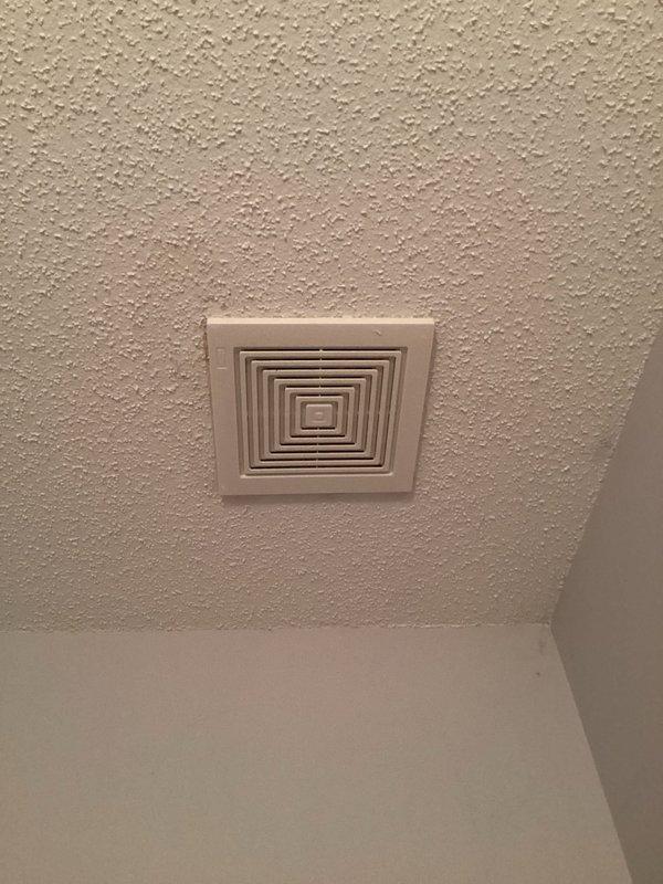 Responded to warranty call for water leakage from AC system into bedroom. Upon inspection, determined system was cooling properly but condensate drain line had improper pitch causing audible dripping noise and water backup. Adjusted condensate line pitch to ensure proper drainage and eliminate noise. Noted water intrusion near bathroom exhaust fan, which appears unrelated to HVAC system. Recommended customer contact duct cleaning company to service bathroom fan and associated ductwork to address moisture issue in that area.