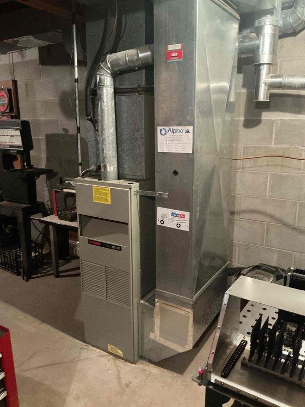 Responded to no cooling complaint on 32-year-old residential air conditioning system. Diagnosed system as low on R22 refrigerant, which is now obsolete and limited in availability. Created and provided custom estimate for recharging the aging system with R22 refrigerant to restore cooling capacity on hotter days.