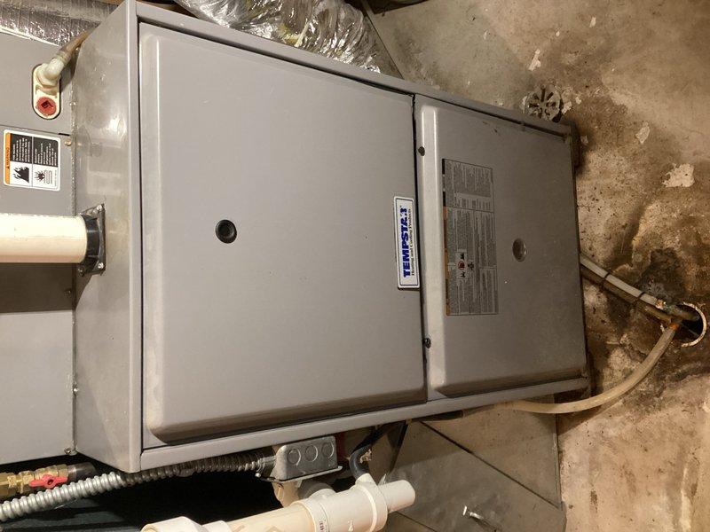 Responded to no cooling complaint and found evaporator coil frozen due to critically low refrigerant charge. Allowed system to thaw completely before performing diagnostics. Recharged system with 4+ pounds of R-410A refrigerant to manufacturer specifications. Verified proper operation with 22° temperature split across evaporator coil. System restored to normal cooling operation. Advised monitoring for potential leak given significant refrigerant loss.