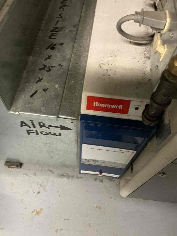 Responded to no cooling call on residential HVAC system over 10 years old with reported water leak in basement. Upon inspection, diagnosed low refrigerant charge and severely plugged evaporator coil restricting airflow and cooling capacity. Added refrigerant to proper operating levels and thoroughly cleaned coil to restore heat transfer efficiency. System tested and confirmed returning to normal cooling operation with proper temperature differential.