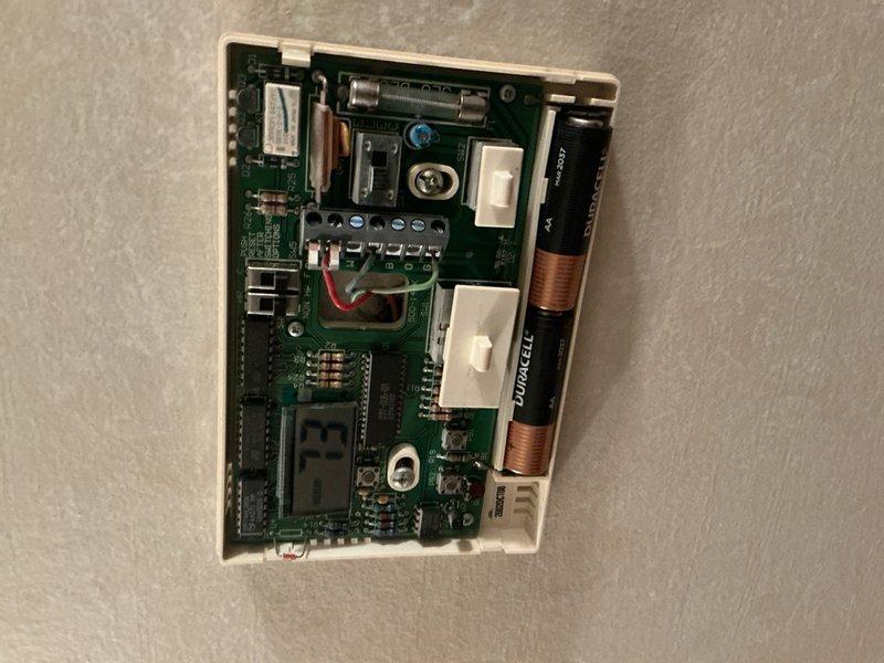 Replaced 20-year-old Robertshaw thermostat that was experiencing intermittent operation issues affecting system control reliability. Removed existing unit, installed new digital programmable thermostat with proper wire terminations to control board, verified heating and cooling functions operational. System tested and confirmed responsive to new thermostat commands.