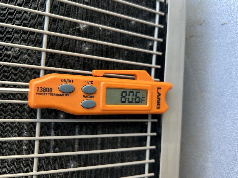 Responded to no cooling complaint with uneven temperatures between upper and lower levels. Inspected air conditioning system and verified clean air filter. Examined supply trunk configuration off plenum for proper reducing fittings to ensure adequate airflow distribution throughout home. Measured total external static pressure at 0.5-0.6 inches water column, confirming acceptable range. Adjusted constant fan setting to 600 CFM and recommended homeowner utilize continuous fan operation to improve air circulation and temperature balance between floors.

Performed outdoor unit diagnostics and refrigerant charge analysis. Connected manifold gauges and measured subcooling at approximately 2°F, indicating system is undercharged. Reviewed equipment data plate specifications for proper refrigerant charge requirements. Recorded ambient temperature at outdoor unit at 80.6°F. Advised homeowner of low refrigerant charge condition requiring additional refrigerant to restore proper cooling capacity.