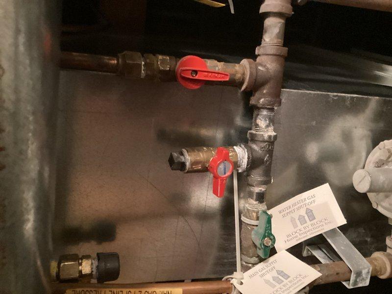 Disconnected and properly capped gas supply line in mechanical room following homeowner's conversion from gas range to electric range. Capped both the gas line to the range location and the ball valve at the gas supply point to allow for potential future use. Performed leak testing to verify system integrity, then closed ball valve and secured loose gas line to prevent movement and noise. All gas connections left safe and code-compliant with supply line preserved for future reconnection if needed.