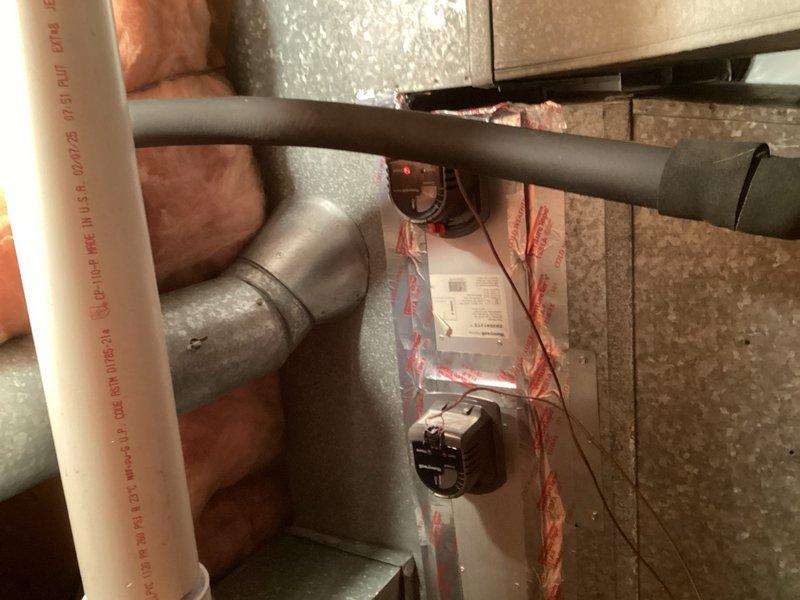 Responded to no cooling complaint on recently installed system. Upon inspection, discovered zoning system misconfiguration with main level thermostat set to cooling mode while lower level thermostat was set to heating mode, creating conflicting calls to the zone control board. Verified zone board and dampers were functioning properly. Educated homeowner on proper thermostat operation for dual-zone system to achieve desired temperature setpoints of 74° upstairs and 71-72° on lower level.