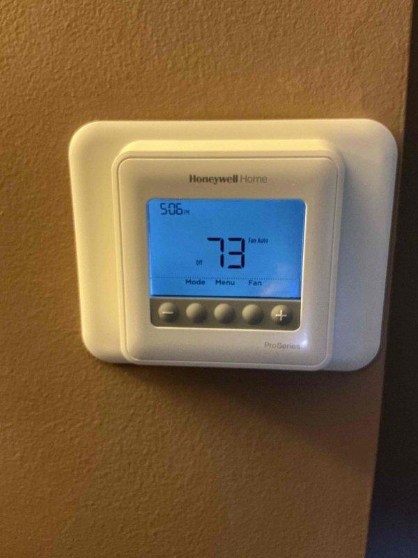 Responded to service call for air conditioning system not operating properly. Upon diagnostic evaluation, identified failed thermostat as root cause of cooling malfunction. Removed existing defective thermostat and installed new Honeywell Home ProSeries programmable thermostat. Verified proper wiring connections, programmed unit settings, and tested system operation to confirm cooling functionality restored. System now operating within normal parameters.