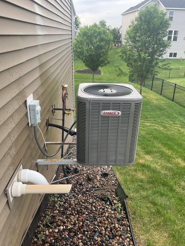 Performed initial seasonal tune-up on newly installed Lennox air conditioning system. Found air filter heavily soiled, restricting airflow to the system. Replaced dirty filter with new filter and advised customer on monthly filter replacement schedule to maintain optimal system performance and efficiency. Inspected outdoor condenser unit, electrical connections, capacitor, and contactor—all components operating within normal parameters. System cooling properly with no issues detected.