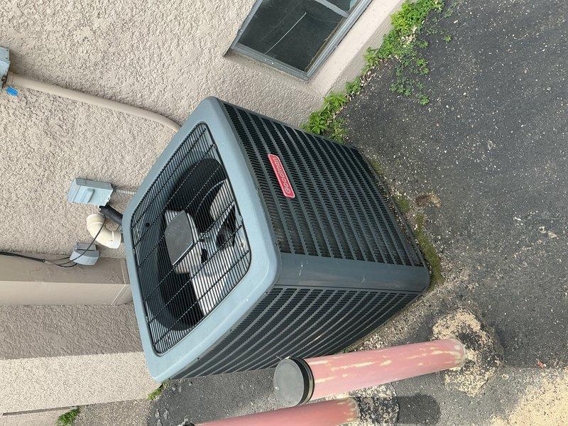 Responded to a no cooling call on a 4-year-old commercial HVAC system at a church facility. Performed comprehensive system diagnostics including inspection of the ground-level condensing unit, indoor air handler, blower motor operation and speed settings, air filter condition, and refrigerant charge levels. All components were found to be operating within normal parameters with no deficiencies identified—system cooling properly at time of service.