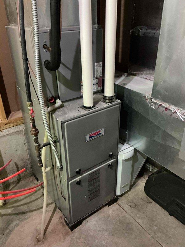 Responded to no cooling complaint on 8-year-old residential air conditioning system with reported ice buildup. Upon arrival, confirmed system was low on refrigerant charge. Discussed repair options with homeowner, who elected to proceed with recharging the system. Added refrigerant to manufacturer specifications and injected UV dye into the system for future leak detection if needed. Cycled system through complete cooling operation and verified proper function. All operating parameters returned to normal range. System restored to full cooling capacity.