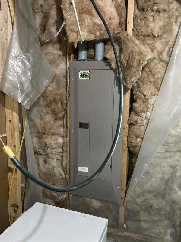 Responded to no cooling complaint on 8-year-old residential air conditioning system with reported ice buildup. Upon arrival, confirmed system was low on refrigerant charge. Discussed repair options with homeowner, who elected to proceed with recharging the system. Added refrigerant to manufacturer specifications and injected UV dye into the system for future leak detection if needed. Cycled system through complete cooling operation and verified proper function. All operating parameters returned to normal range. System restored to full cooling capacity.