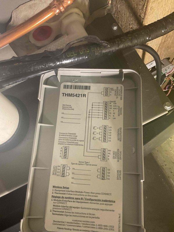 Responded to no cooling complaint on newly installed Lennox system where outdoor unit was running but indoor blower was not operating. Diagnosed faulty thermostat preventing proper system communication and blower operation. Removed defective thermostat and installed new Honeywell Home wireless thermostat with equipment interface module, completing all wiring connections per manufacturer specifications. Verified proper system operation with indoor blower running and unit cooling effectively upon completion.