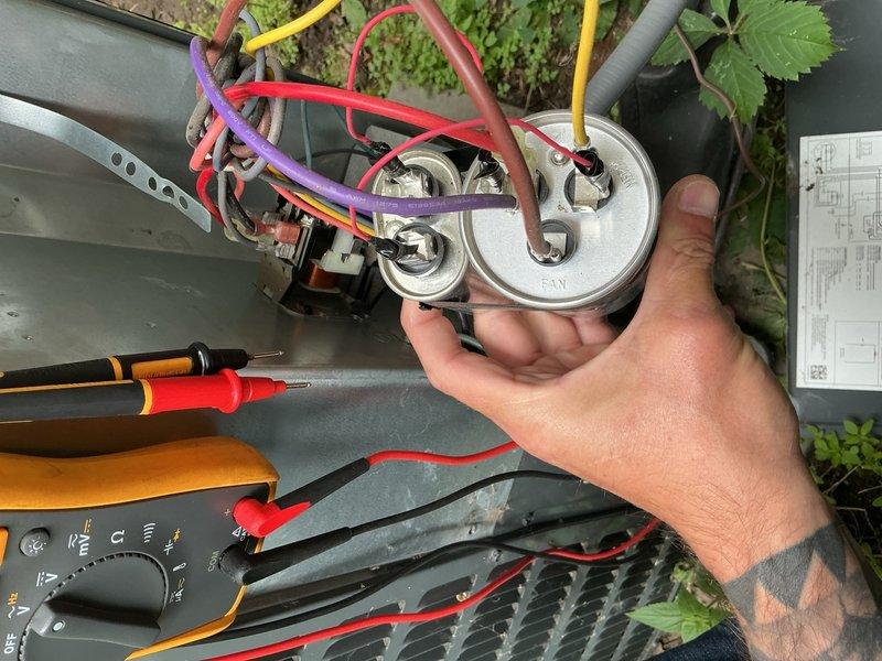Responded to no cooling complaint on 6-year-old system. Found tripped breaker at outdoor condensing unit, reset breaker and restored power to system. Performed comprehensive system diagnostics including refrigerant level verification, capacitor testing with multimeter, and visual inspection of electrical connections and components. All refrigerant levels, electrical components, and system operations checked normal after breaker reset. Advised customer on filter replacement maintenance. System restored to full cooling operation.